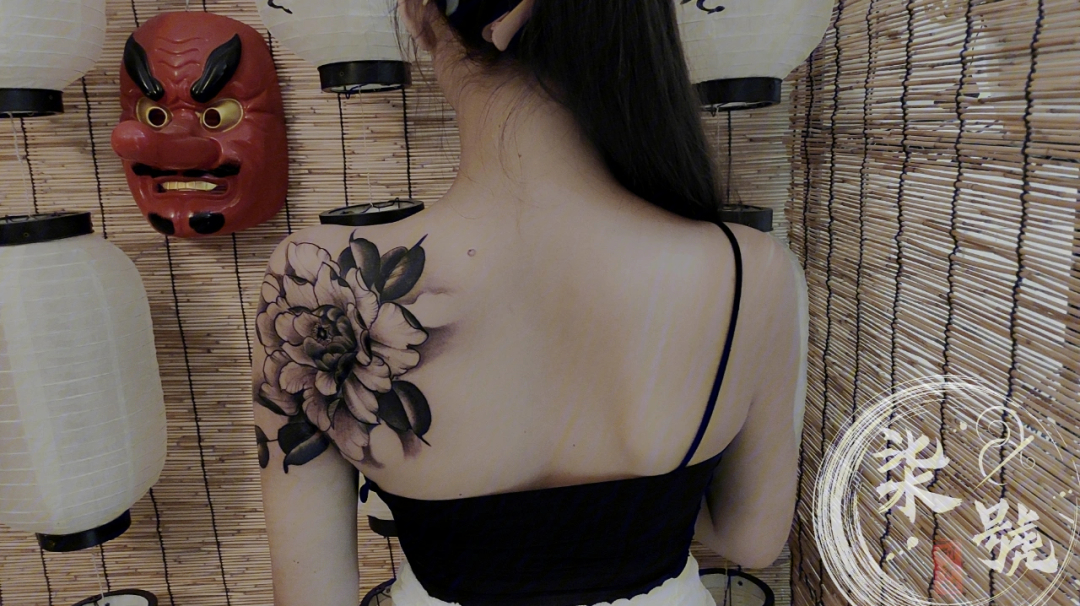 女人纹身牡丹代表什么图片
