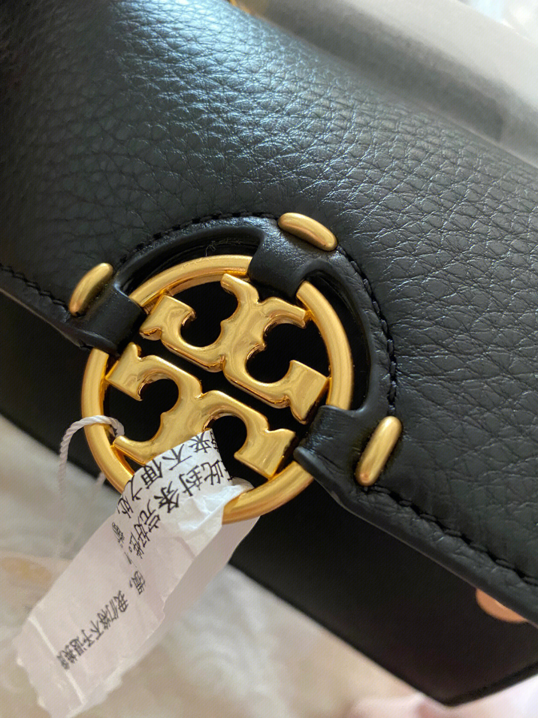 真假辨别汤丽柏琦toryburch