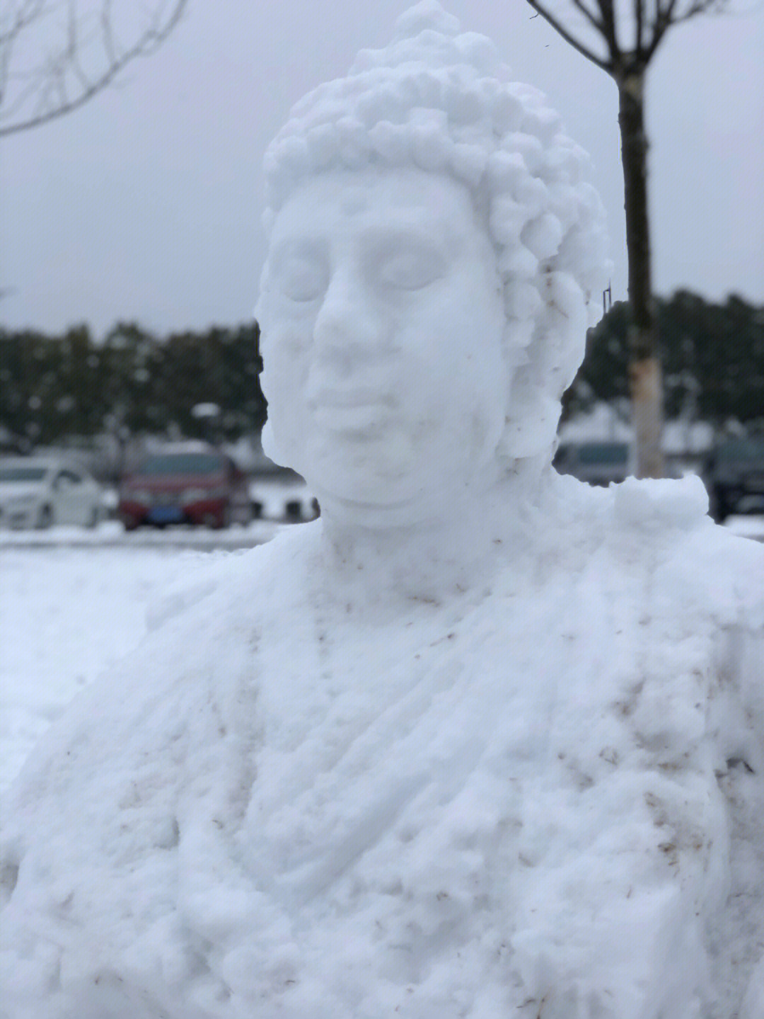 笑面佛雪人图片