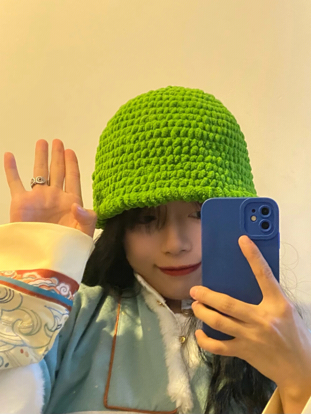 女生戴绿色帽子含义图片