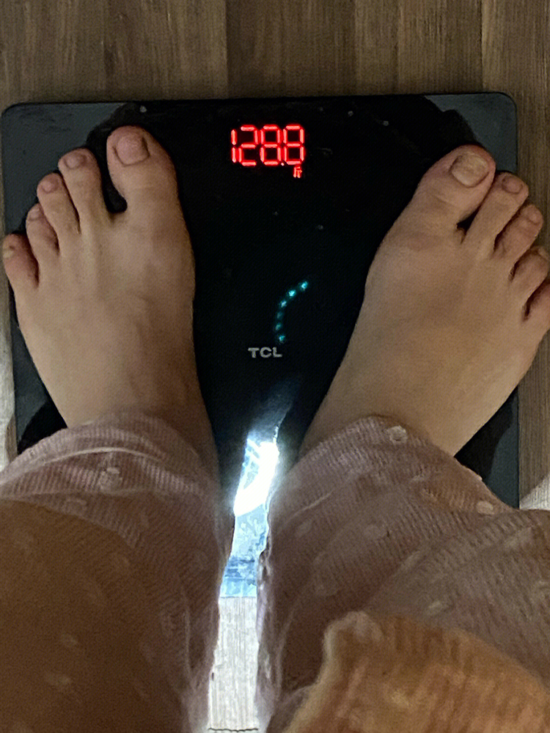 晒125斤称体重图图片