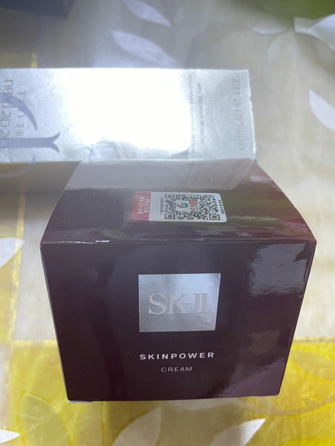 sk2赋能焕采精华霜