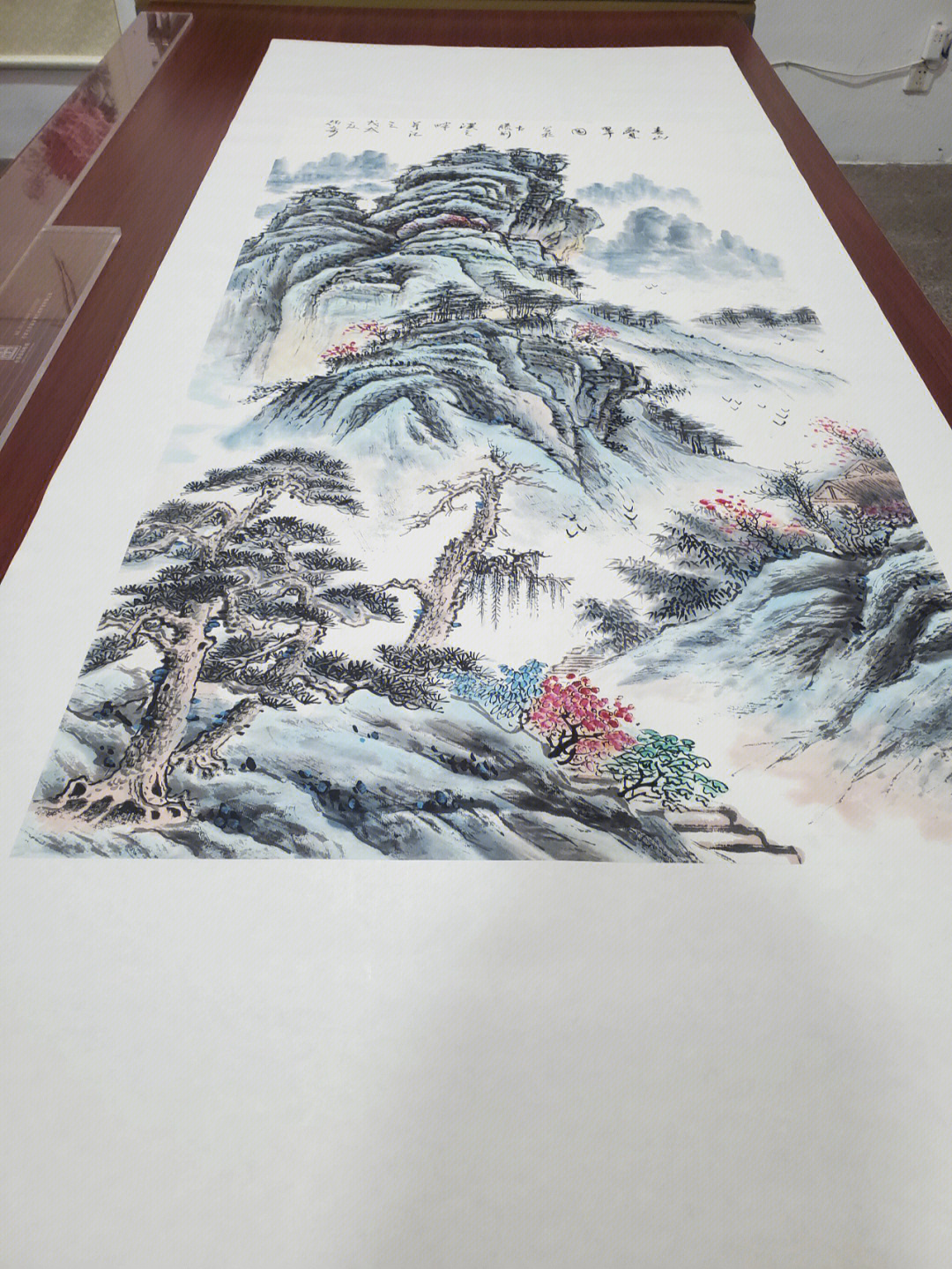 今天装裱一幅山水画,还没出成品,正想着装裱什么样式