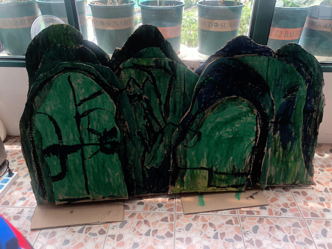 幼儿园土堆假山设计图片