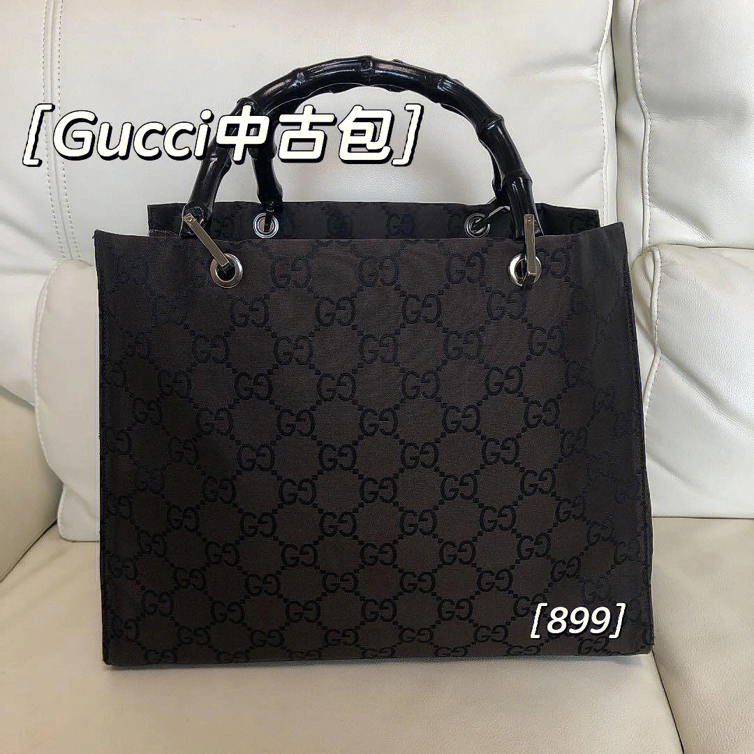 gucci黑色和白色的纸袋图片