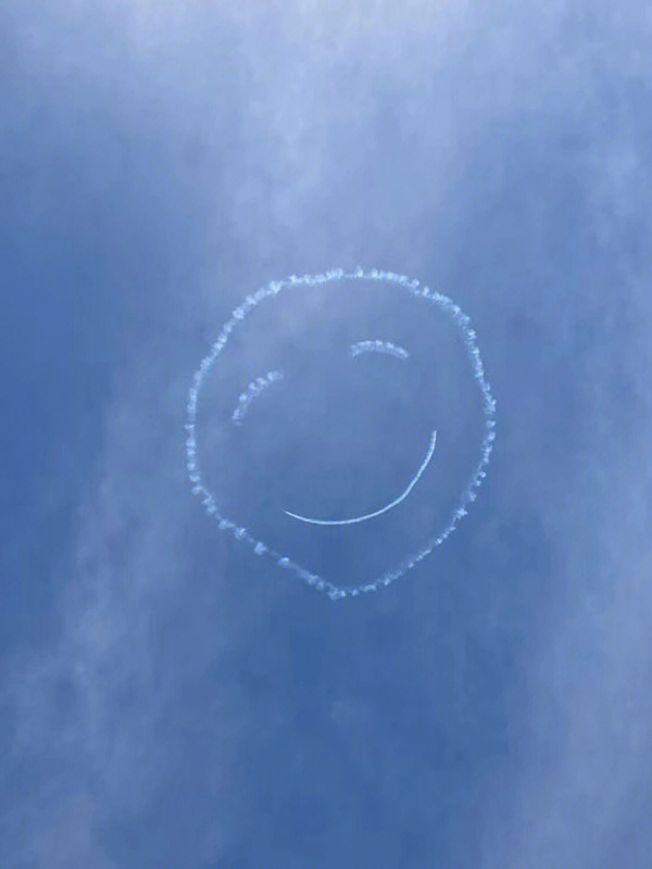 天空笑脸棒棒糖图片图片