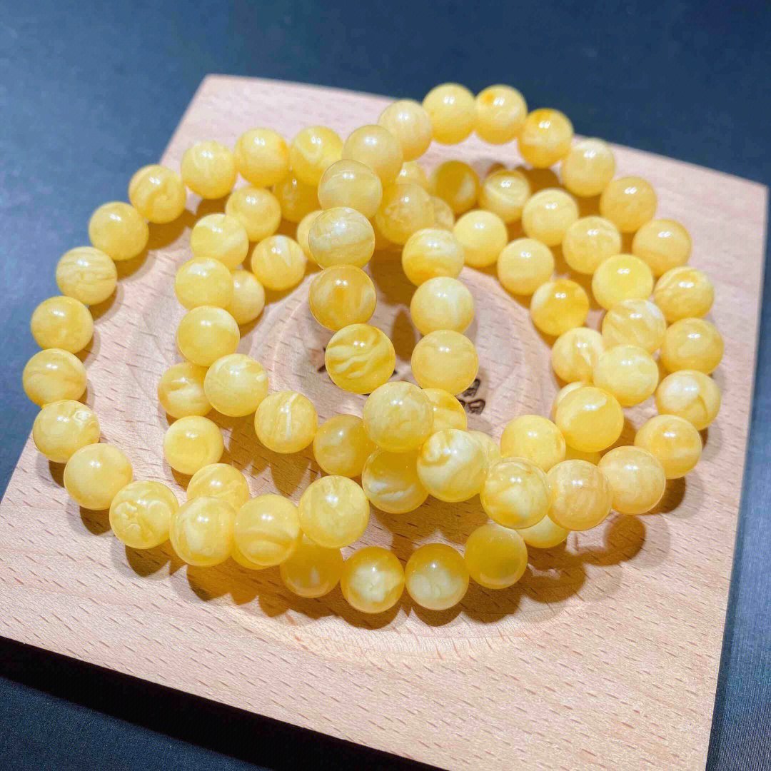 蜜蜡最轻盈,最绚烂的宝石,它四季常温,冬不冰,夏不热蜜蜡功效:115